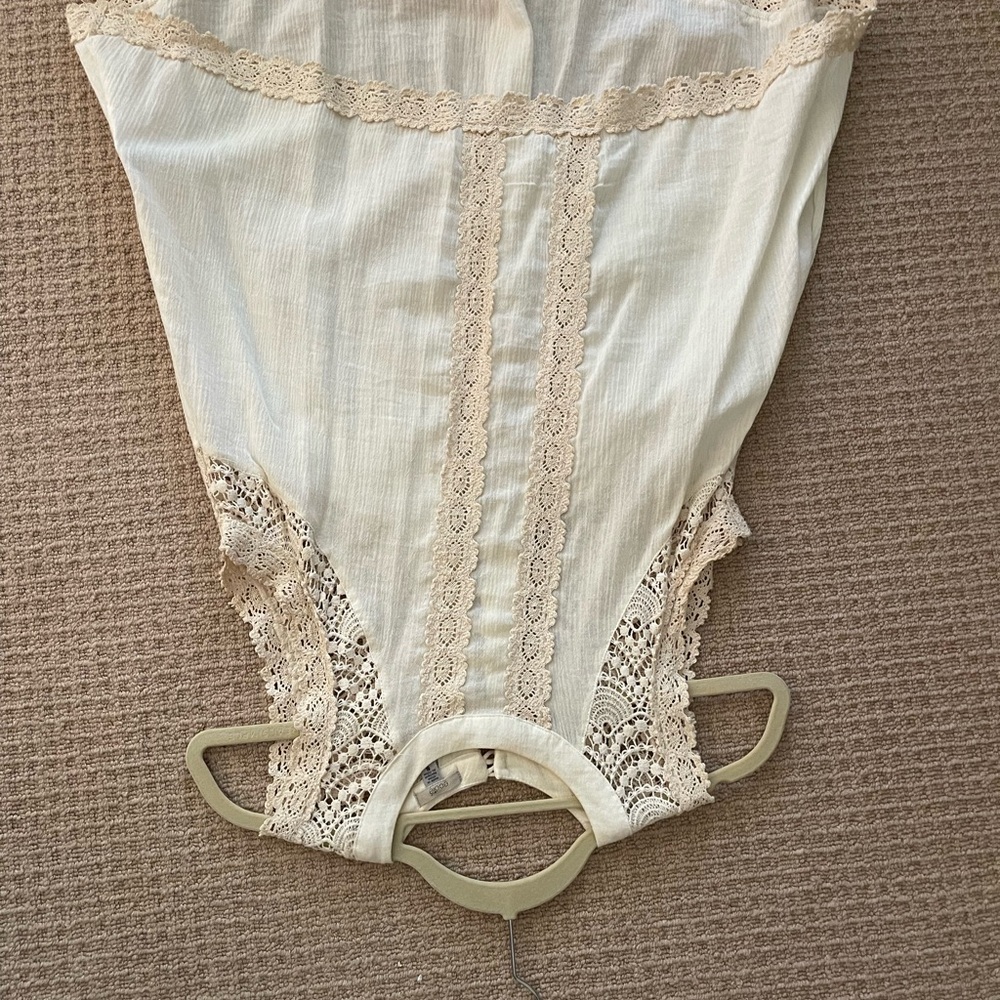 Elegant Cream Lace Bodysuit